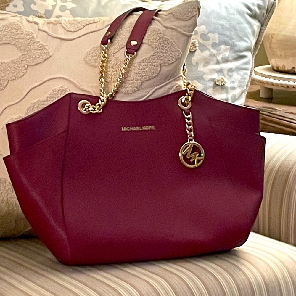 Brand New Beautiful red Michael Kors very large purse.